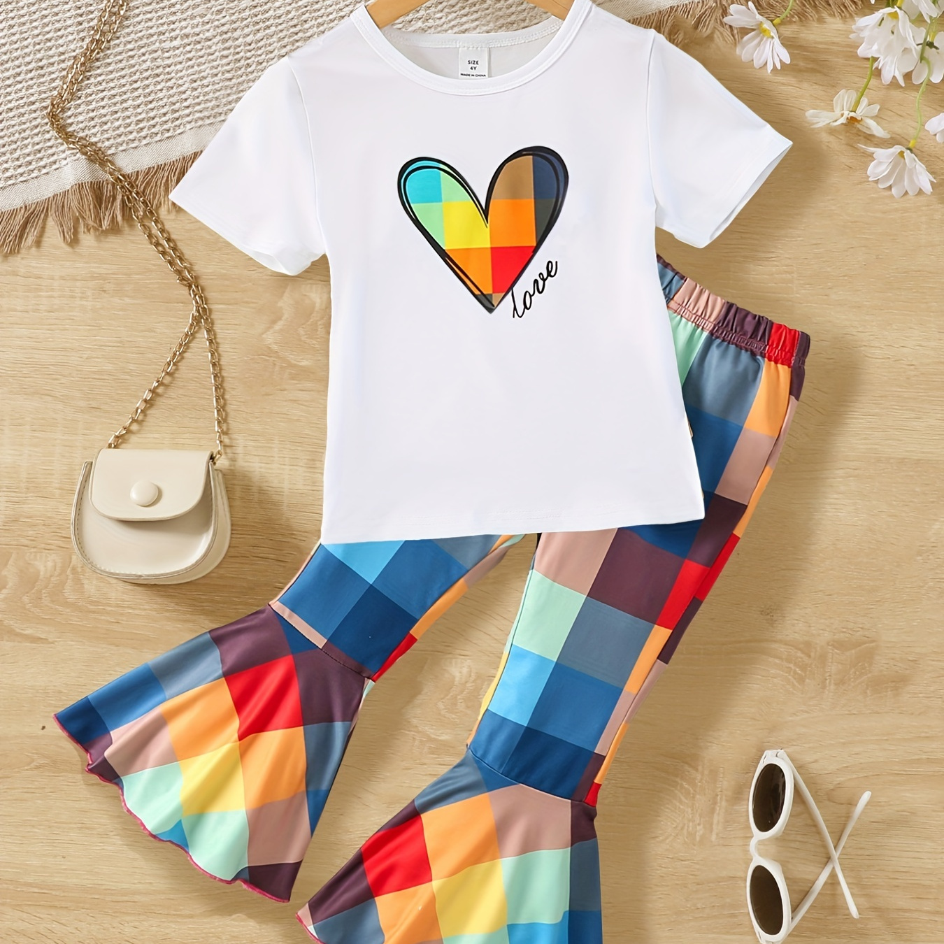 

2pcs Toddler Girls Heart Graphic T-shirt Round Neck Tee Tops & Colorful Plaid Flare Leg Pants Set Kids Summer Clothes