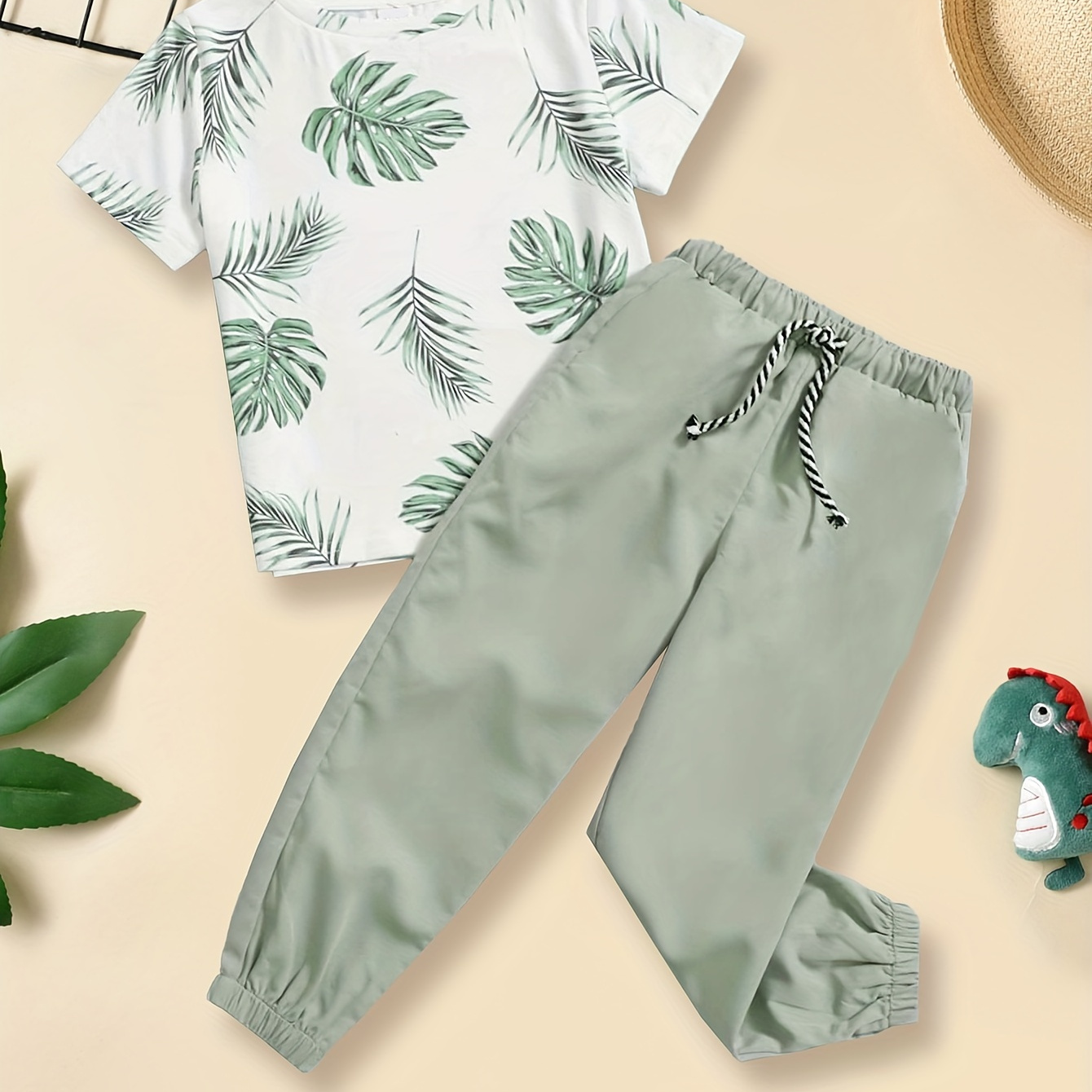 

2pcs Boys Casual Tropical Leaves Graphic Print Short Sleeve T-shirt & Solid Color Pants Set, Comfy Boys Clothes