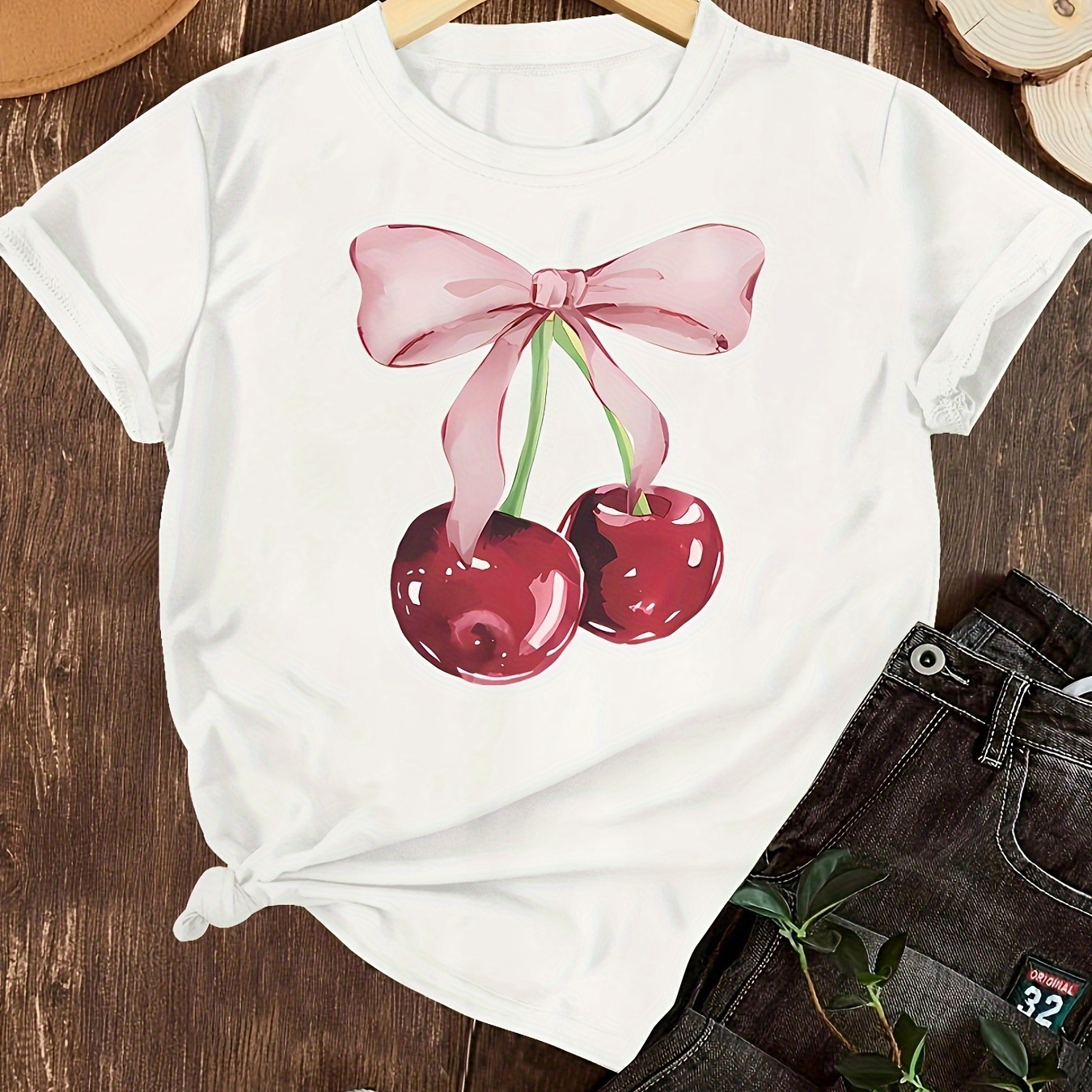 

Fashionable Short-sleeved Women's Top With A Cherry Print And A Round Neckline.