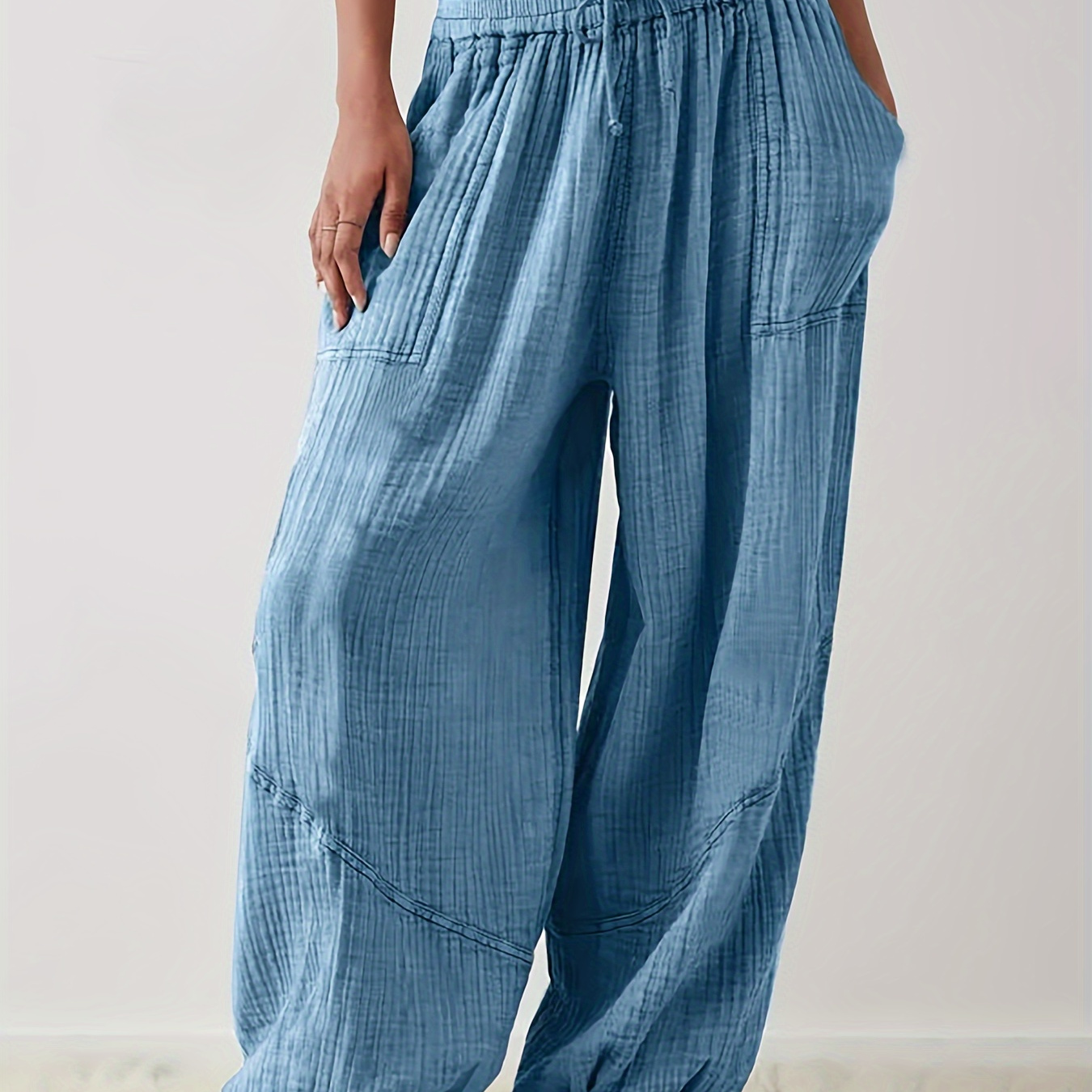 

Plus Size Solid Pocket Baggy Pants, Casual Drawstring Elastic Waist Pants, Women's Plus Size Clothing
