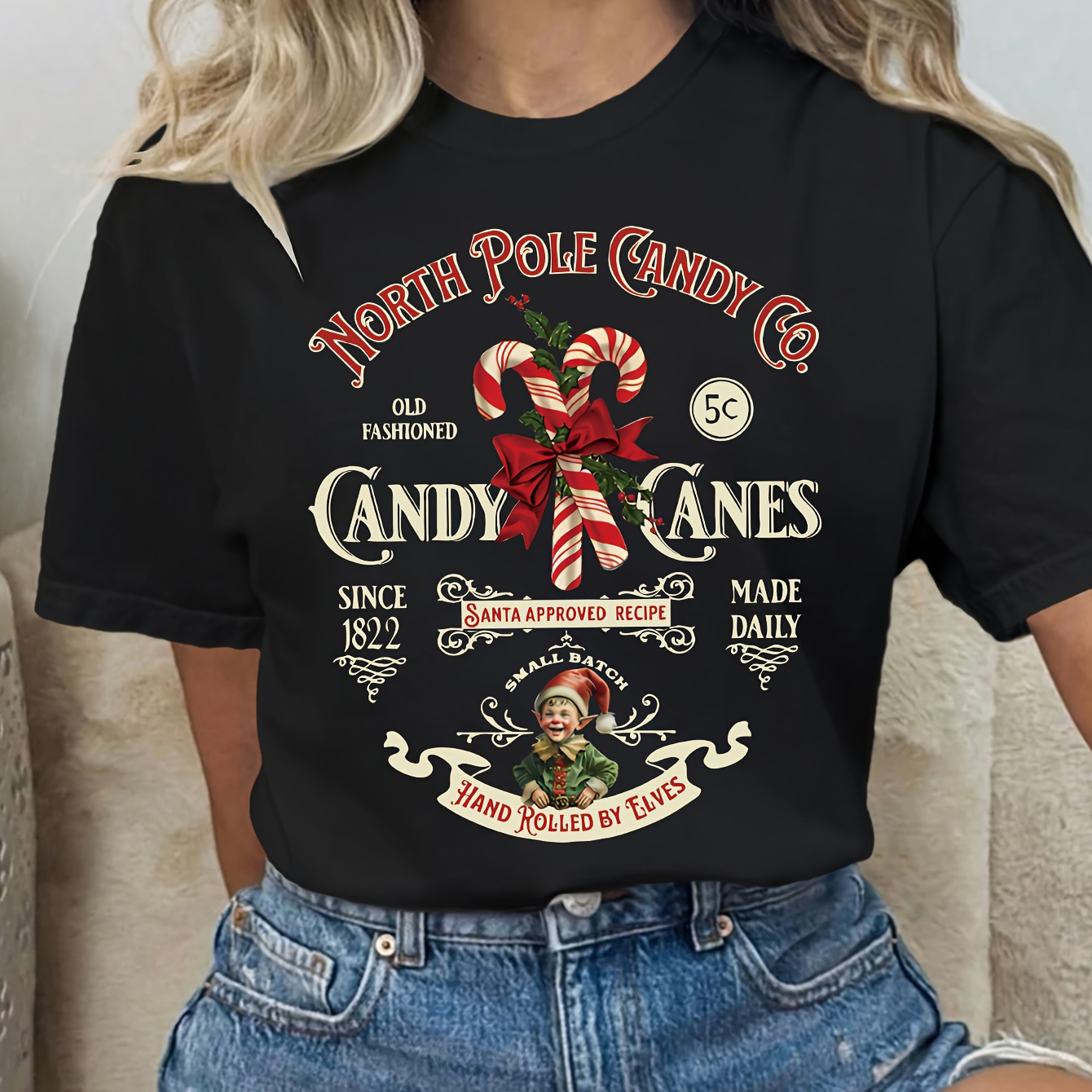 

Women's Plus Size Christmas T-shirt - Black Short Sleeve Crew Neck Featuring Santa Claus & Candy Canes Graphic,