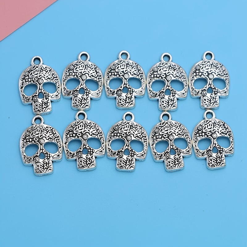 10pcs 24x16mm Vintage Silvery Plated Skull Head Creative Charm Pendants Fashion For Bracelet Necklace Earrings Keychain Bag Clothing Charms Jewelry Making DIY Handmade Craft