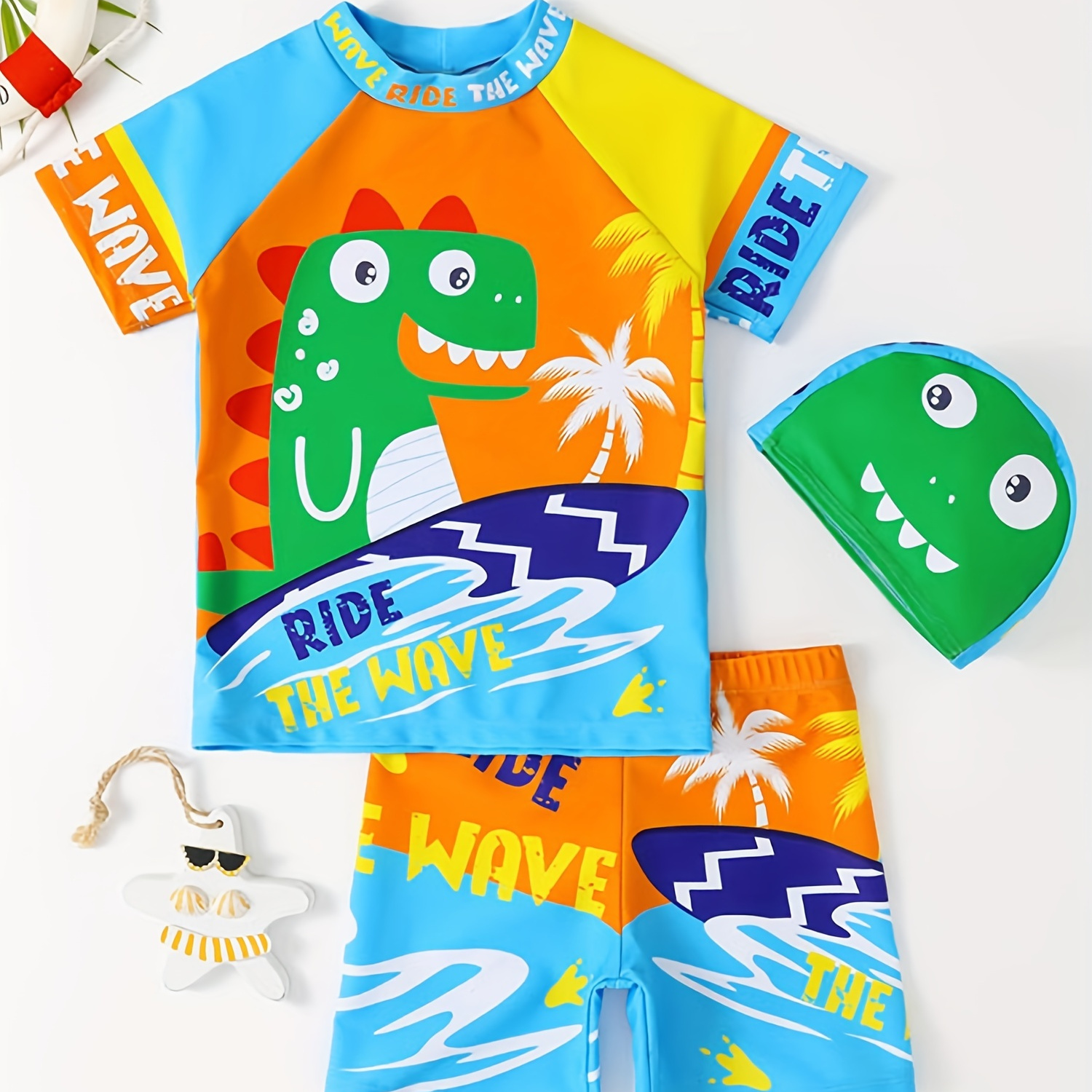 

Boys Cartoon Dinosaur "ride The Wave" Color Block Swimming Suit Swimming Trunks & Tops & Cap Casual Kids Clothes
