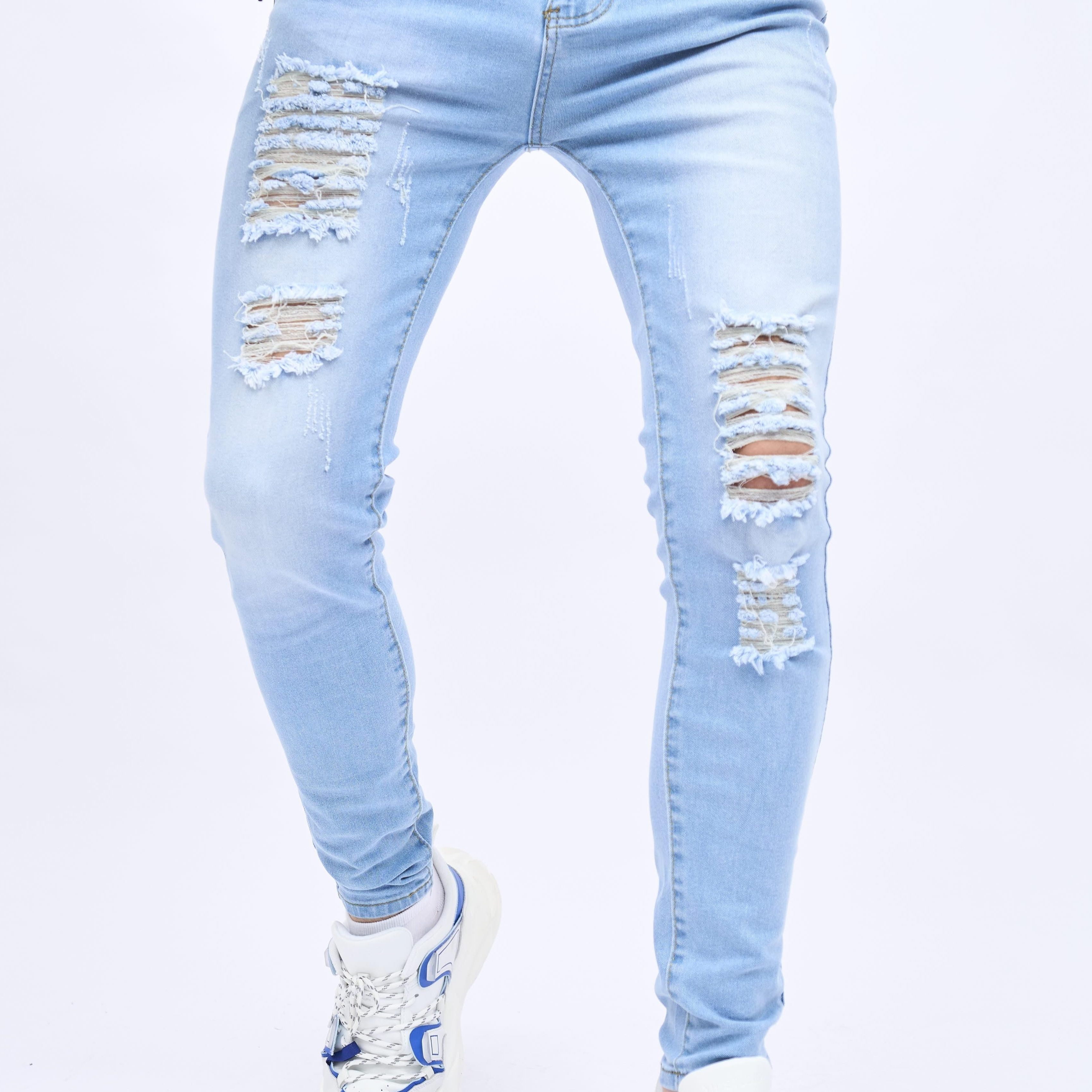 

2023 Retro Distressed Knee Ripped Jeans Slim Small Feet Light Blue Cotton Jeans