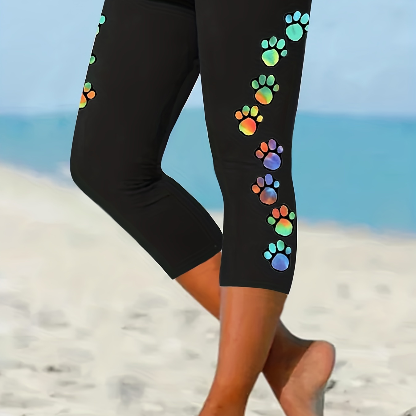 

Leggings with a pattern of dog paw prints, comfortable cropped pants,