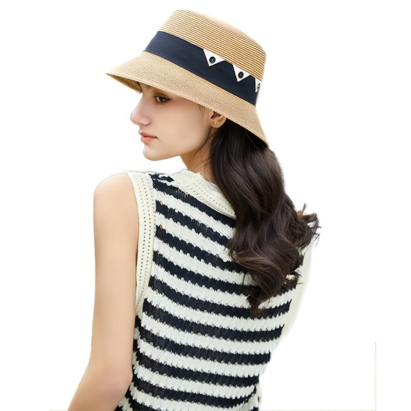 light-tan-bucket-hat-straw-hat-black-strap-button-white-triangle-decor