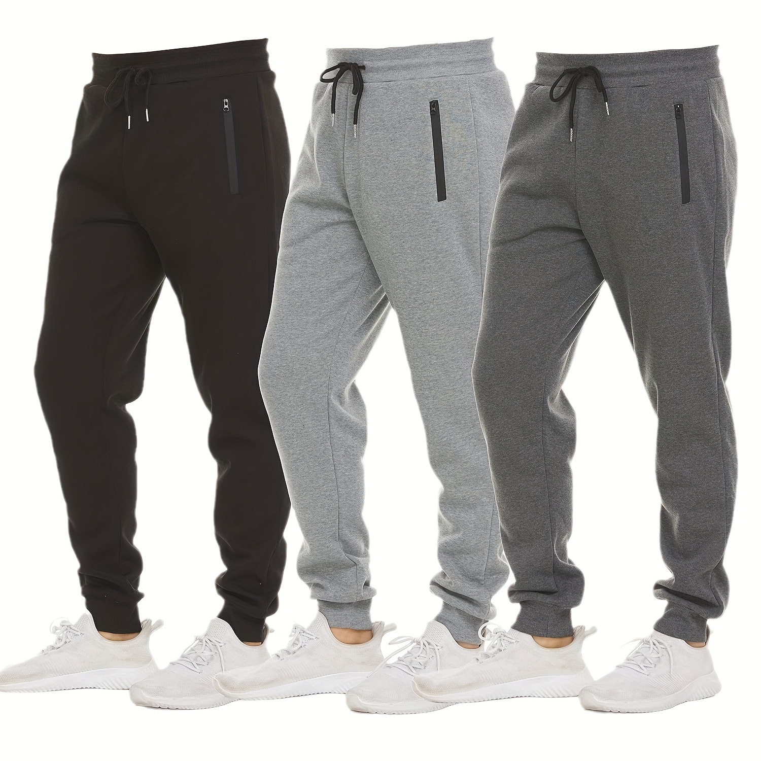 

Pantalon de sport pour garçon avec taille élastique et poches zippées, coupe ajustée, adapté à toutes les saisons.