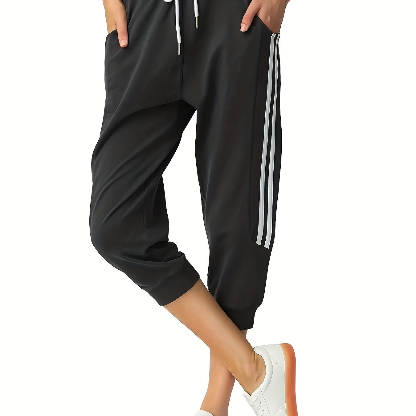 

Pantalon capri de sport pour femmes, idéal pour la course à pied, le yoga et le fitness, noir avec des rayures blanches, tenue active décontractée