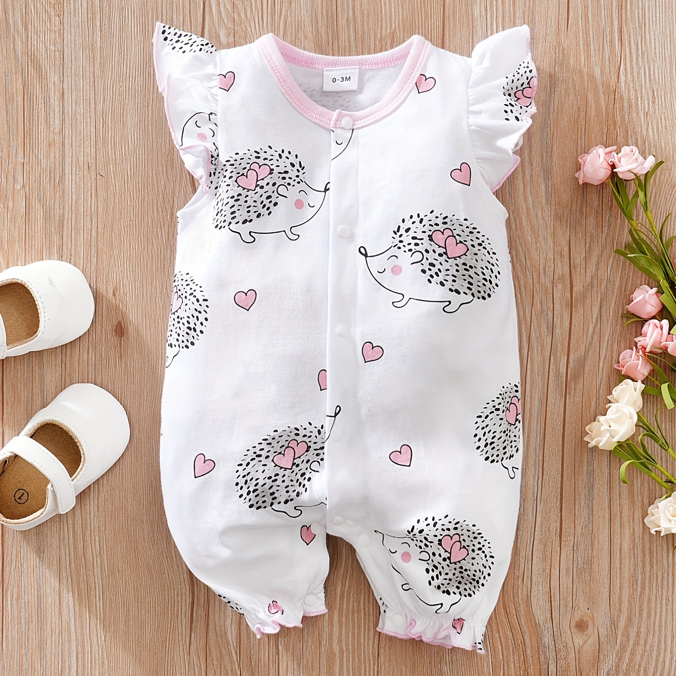 

Comfy & Cute: Hedgehog Print Flutter Sleeve Baby Girls Jumpsuit