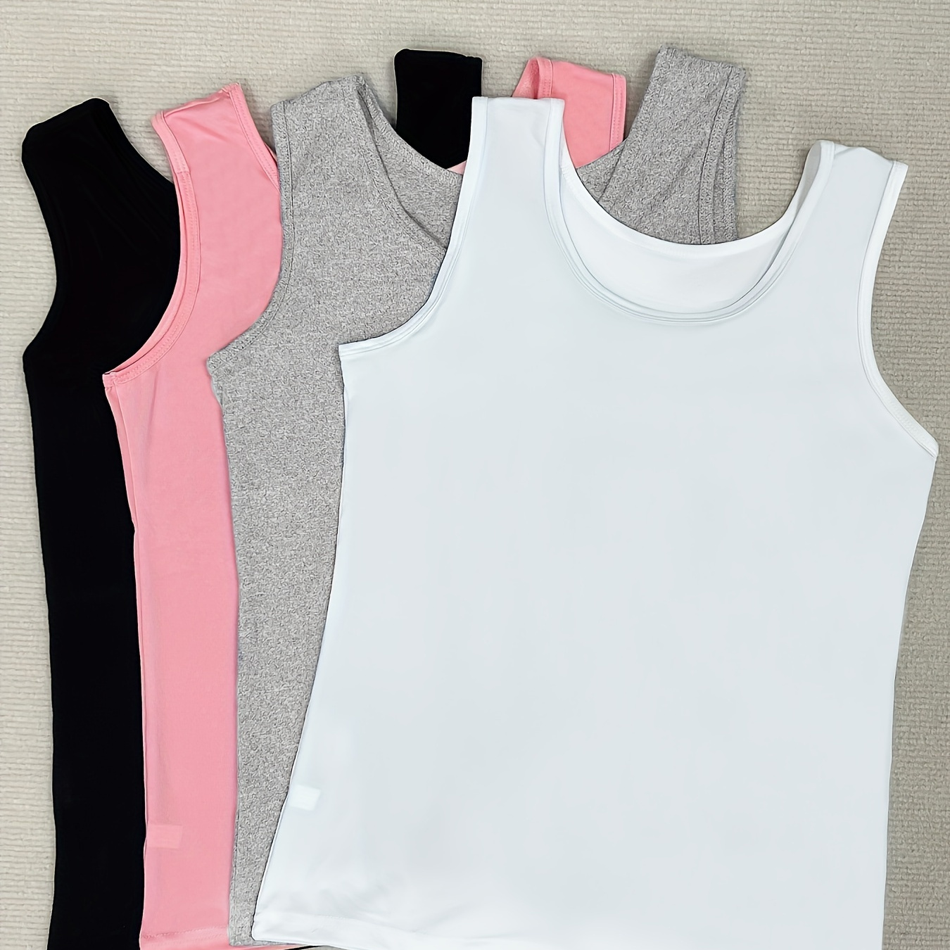 

Set Of 4 Women's Multicolored Comfortable Casual Wide Strap Sleeveless Tank Tops