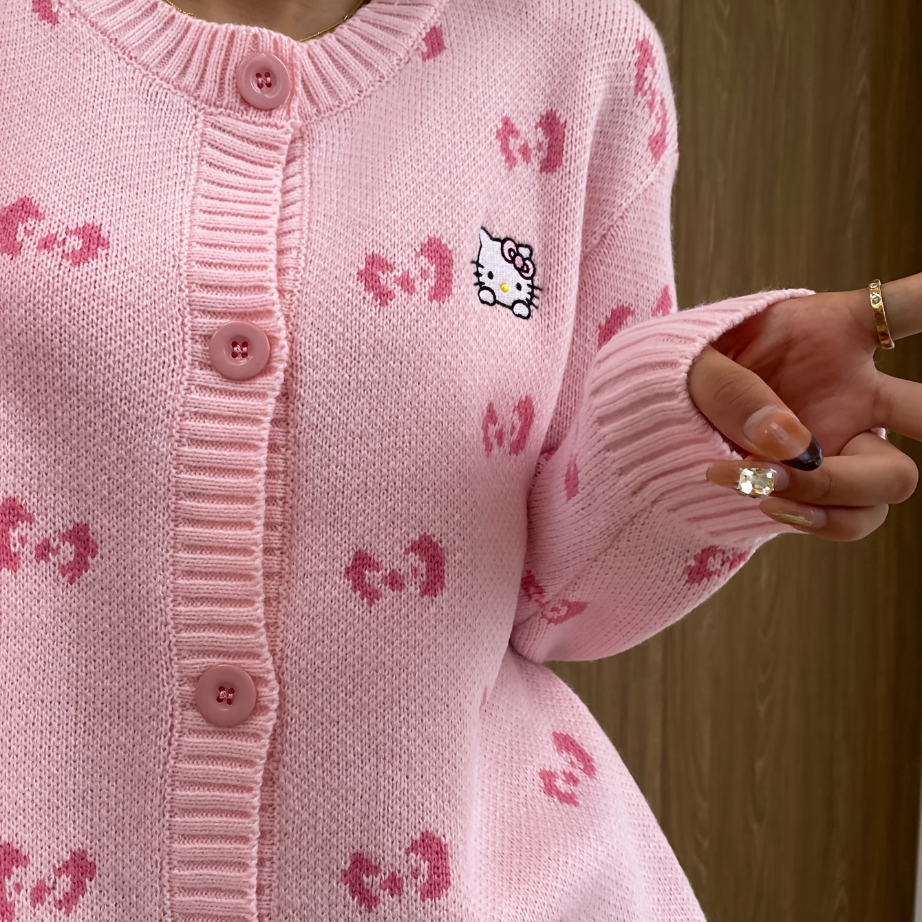 

Sanrio Hello Kitty Pink Knit Cardigan For Women - Loose-fit Sweater With Cartoon Pattern, Button Closure, Long Sleeves - Soft Polyester, Ideal For All