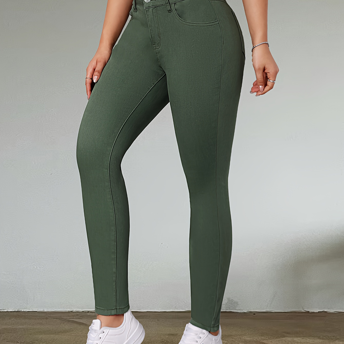 

Jean skinny en coton extensible vert élégant pour femmes avec détail boutonné, pantalon long tissé de couleur unie pour toutes les saisons.