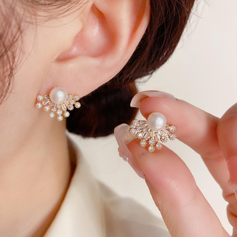 Unique pearl deals earrings