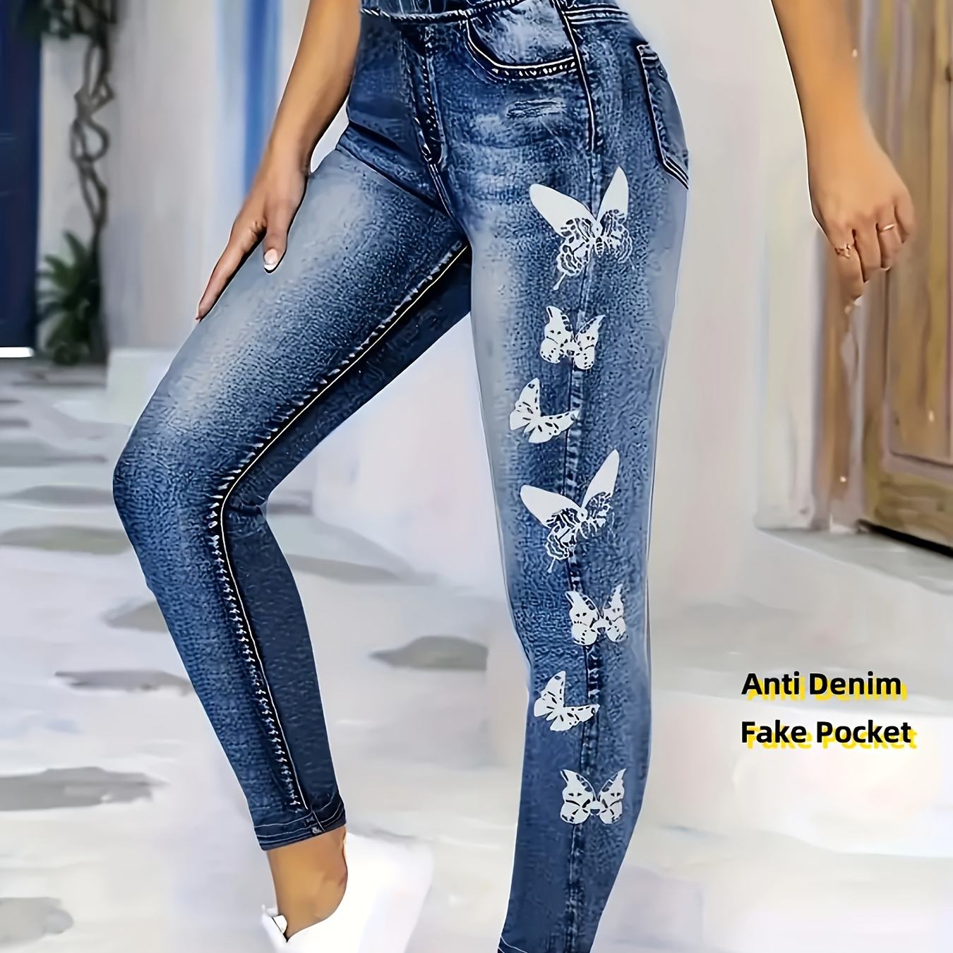 

Pantalon serré en polyester 100% à imprimé papillon, taille haute, design décontracté avec poches , idéal pour toutes les .