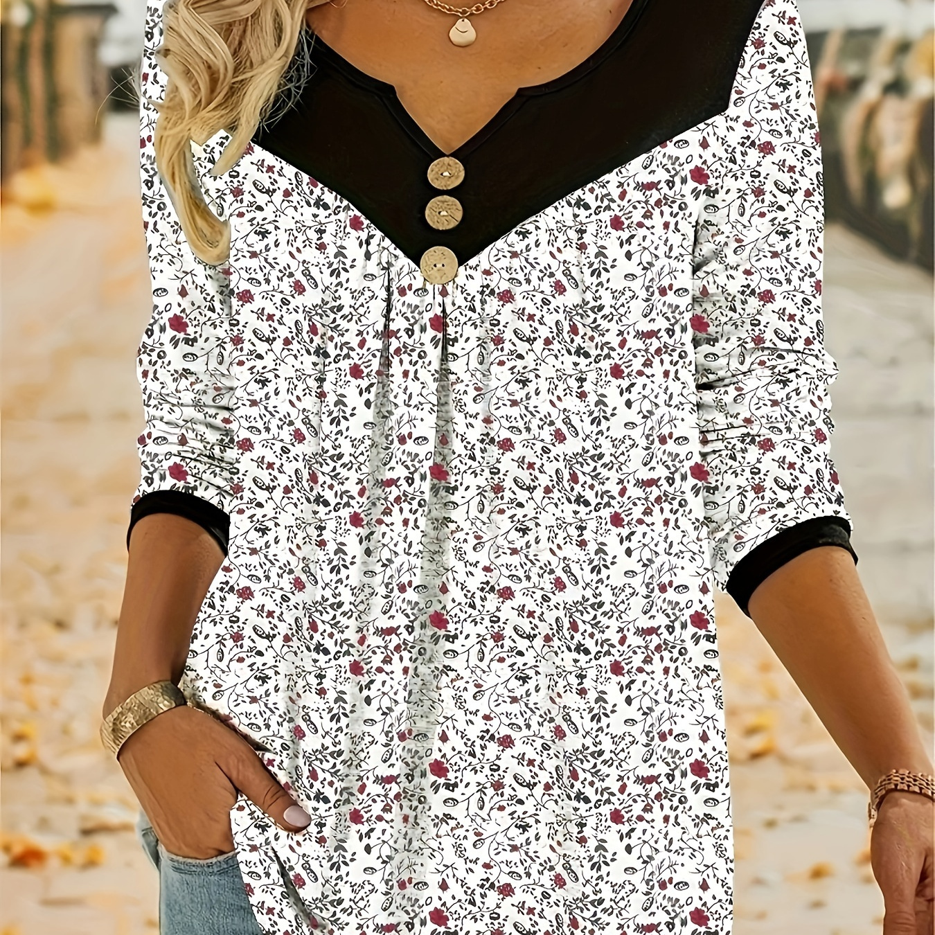 

T-shirt à imprimé floral grande taille avec boutons décoratifs, haut décontracté à col cranté à manches longues pour le printemps et l'automne, vêtements grande taille pour femmes