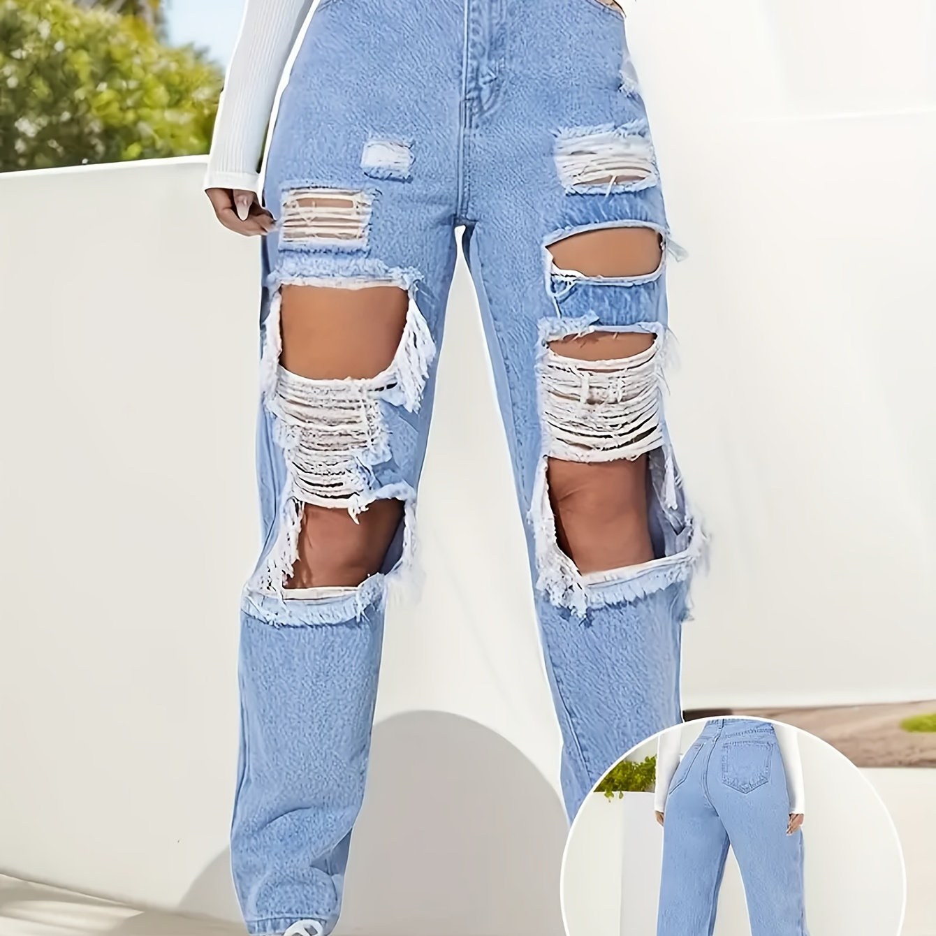 

Stylish Ripped Blue High- Jeans With Stylish Straight Cut, Pockets In A , Women' Jeans Are For Women And Suitable For A Of