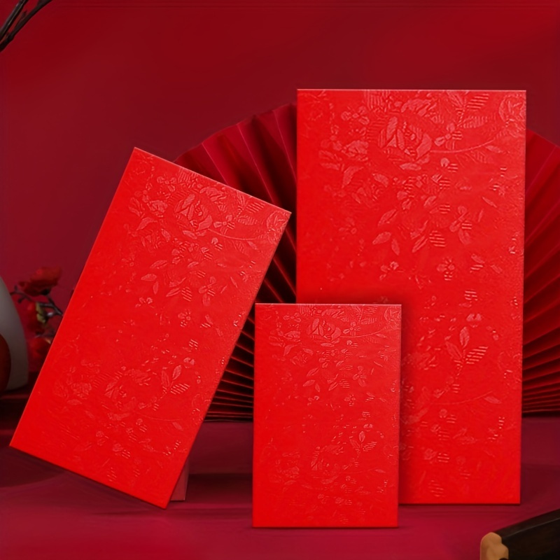 FILE--View of hongbao or red envelopes filled with lucky money in