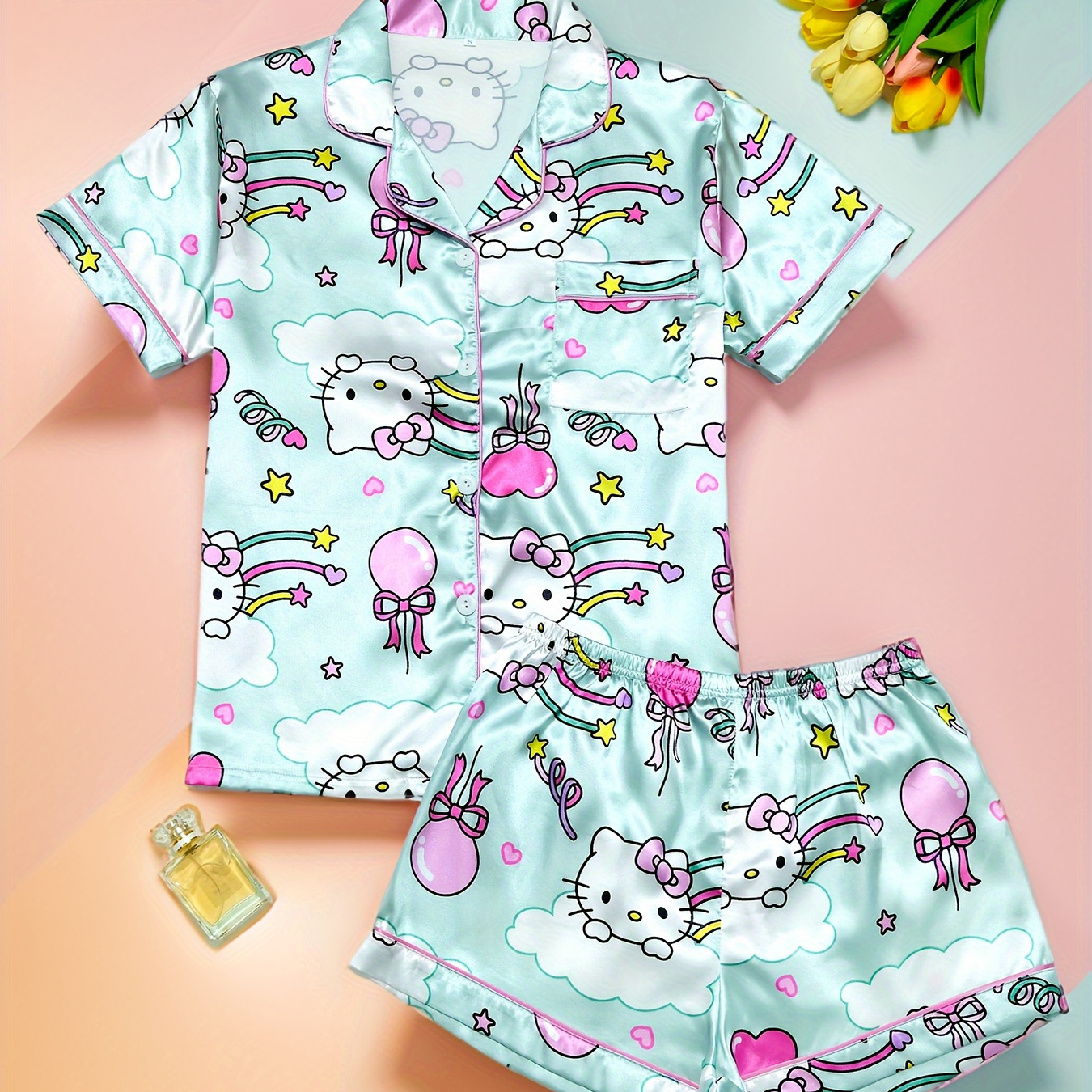 

Sanrio Hello Kitty Print Satin Pajama Set For Teenagers, Featuring A Button-up Short-sleeve Top With A Collar And Matching Shorts.