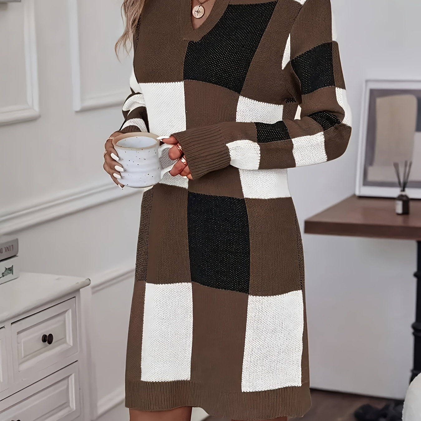 

Elegant Knee-length Knitted Dress With A Patchwork Design And A V-neck.