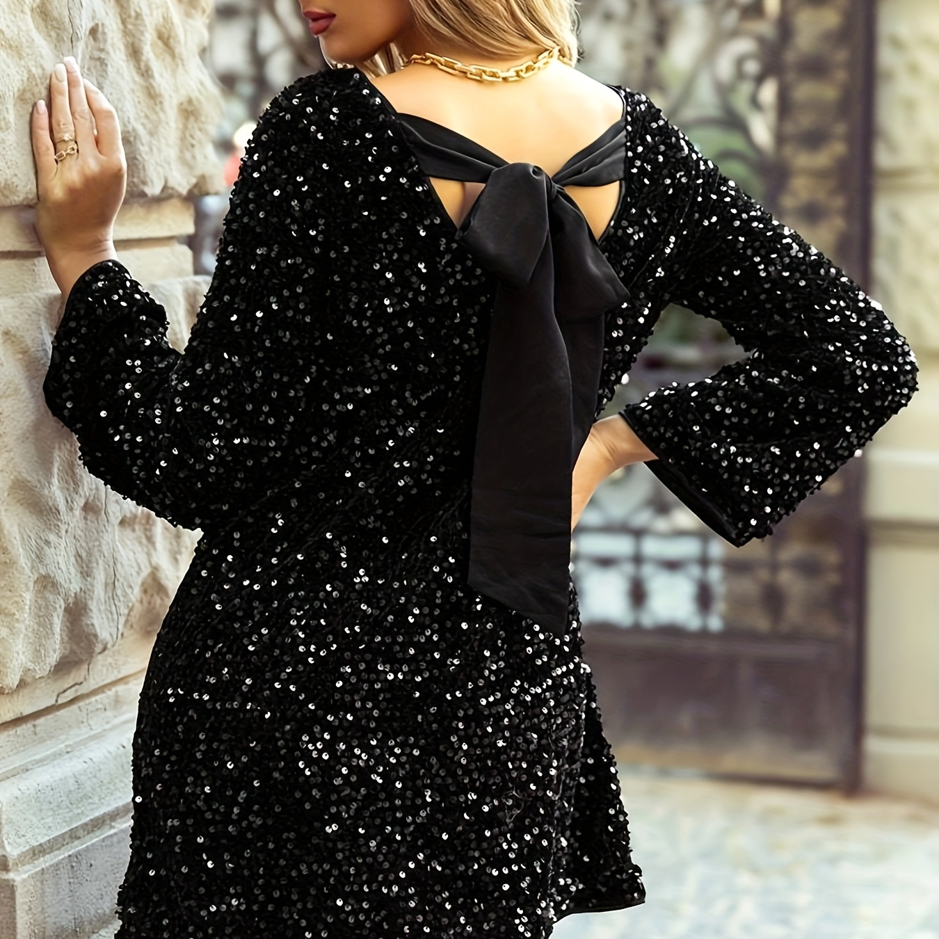 

Elegant Black Sequin Mini Dress With Tie-back Detail - Long Sleeve, Crew Neck, Knit Fabric - Parties & Banquets