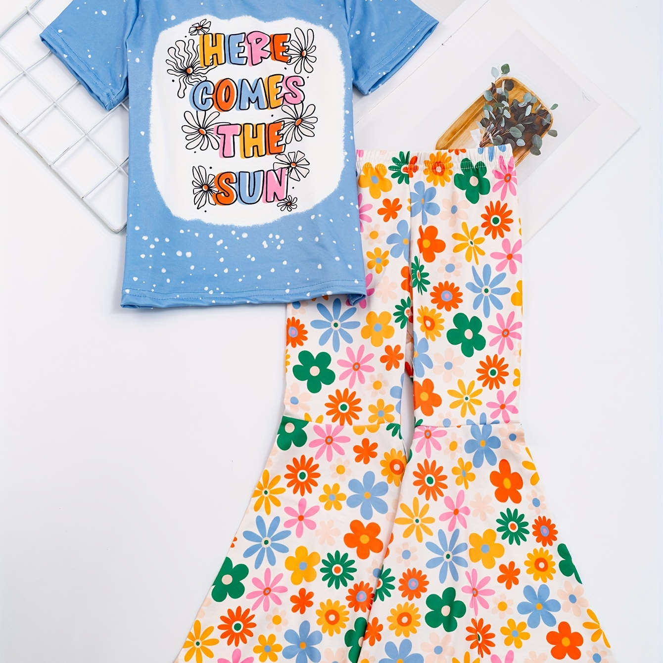 

2pcs, Here Comes The Sun Print Short Sleeve T-shirt Top + Flower Print Flare Pants Set Outdoor Gift For Girls Summer