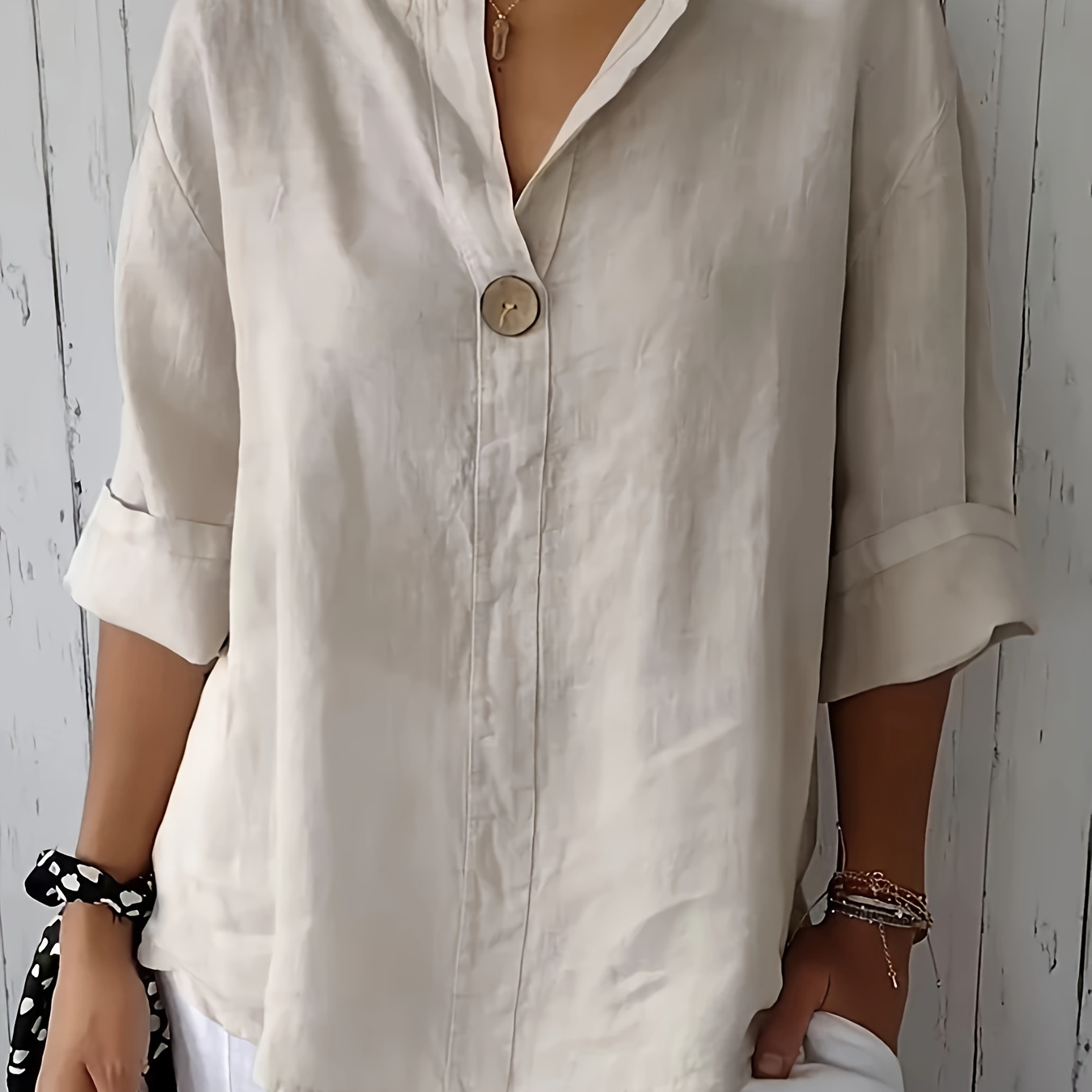 

- New Loose-fitting Women's V-neck Button Top