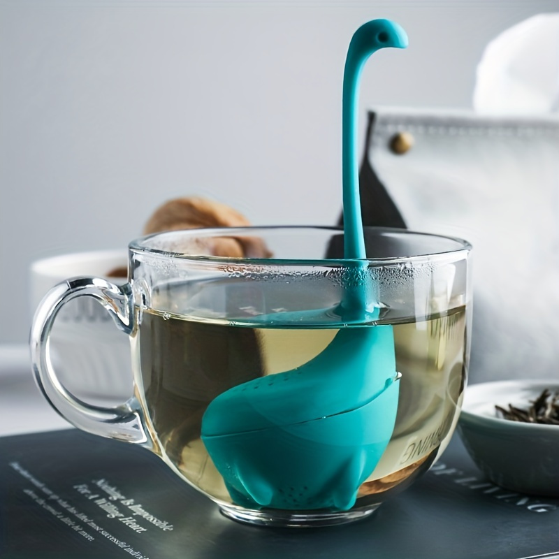 OTOTO Baby Nessie Loose Leaf Tea Strainer with Steeping Spoon - Cute Lake Monster Silicone Tea Infuser for Herbal Tea Gifts
