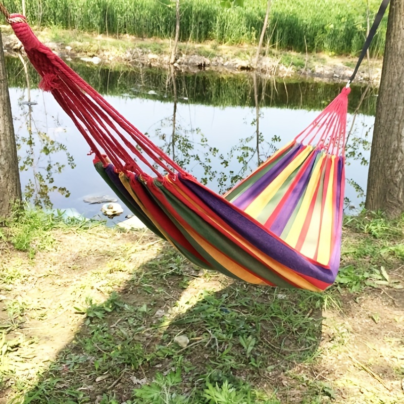 Relax in Comfort with this Stylish Outdoor/Indoor Balcony Hammock - Perfect for Summer Travel!