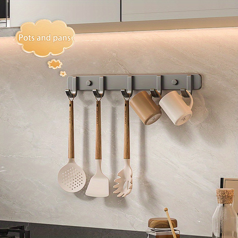 Colgador de barra de acero inoxidable para utensilios de cocina, soporte  para cuchara, riel con ganchos deslizantes, organizador de almacenamiento  para olla y sartén, montado en la pared - AliExpress