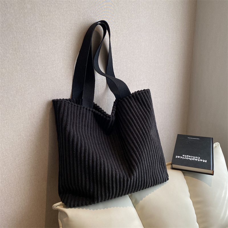 Pleats Please Issey Miyake Pleated Woven Tote Bag in Black