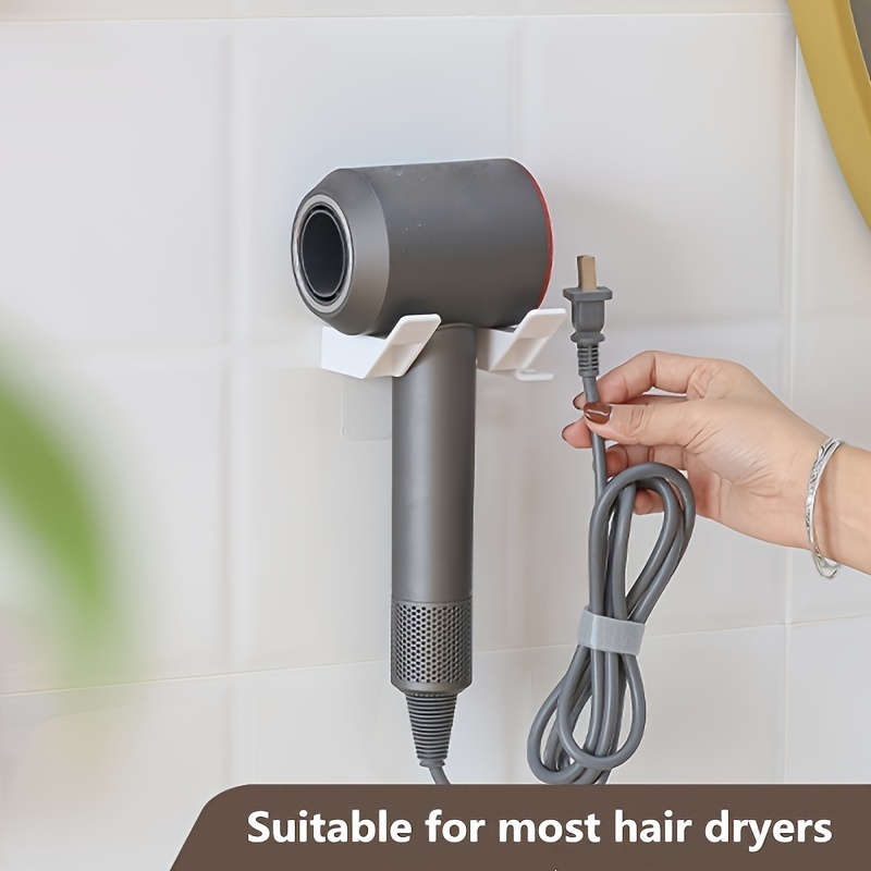 Soporte ajustable para secador de pelo, manos libres, soporte para secador  de pelo, montado en la pared, sin perforaciones, soporte para herramientas