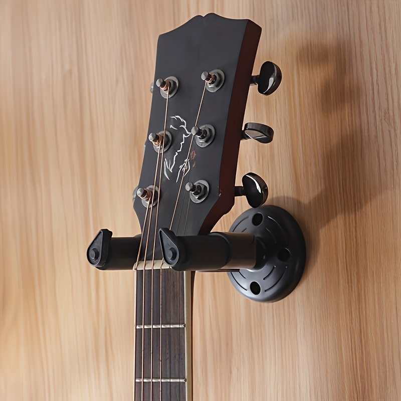 Soporte de pared para guitarra con 2 gomas giratorias, estante colgante de  madera con soporte para púas, estante de almacenamiento, soporte de pared