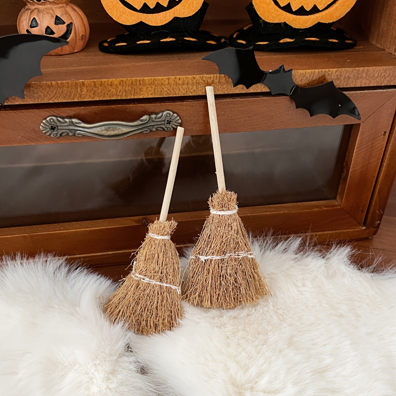 Escoba de bruja para decorar en halloween