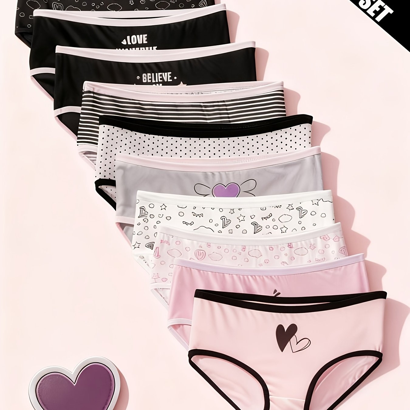 Image of A Set Of ' Underwear Featuring Cartoon Hearts And Star Designs, With And A , Perfect For Comfortable Wear In