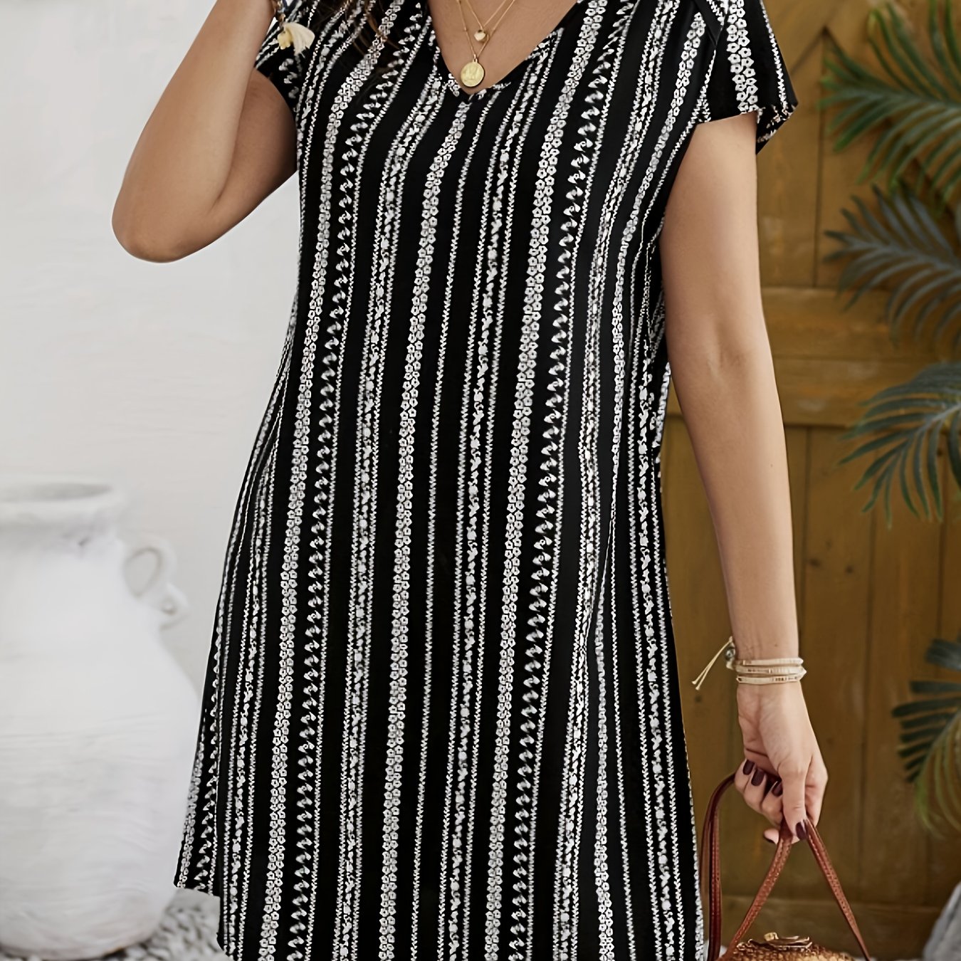 Image of Spring, Summer And Autumn Fashion Floral Print Black V-neck Mid-length Dress