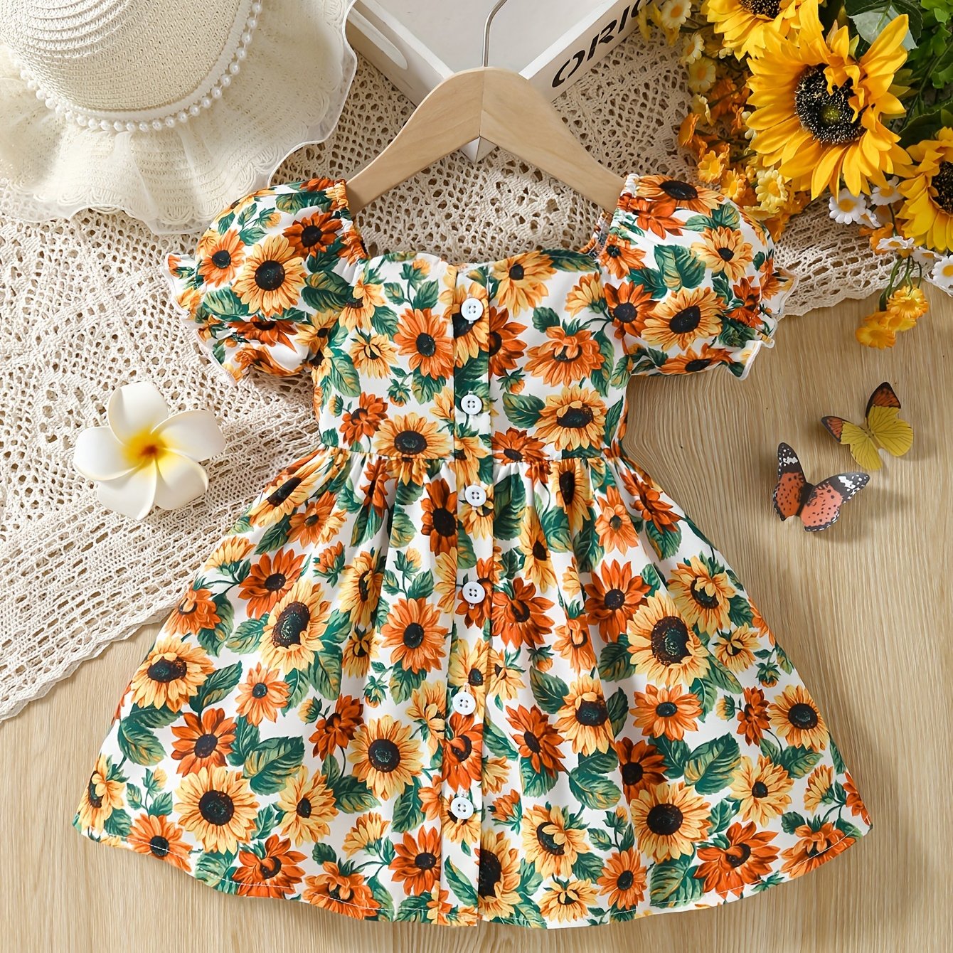 Image of Girls' New Summer Casual Dress With Full Floral Print, Ruffle Hem, And Puff Short Sleeves