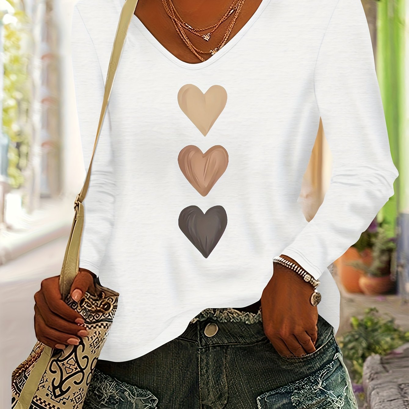 TEMU Camiseta casual de mujer con estampado de corazones, diseño de moda a colores para otoño e invierno, cuello en V y larga