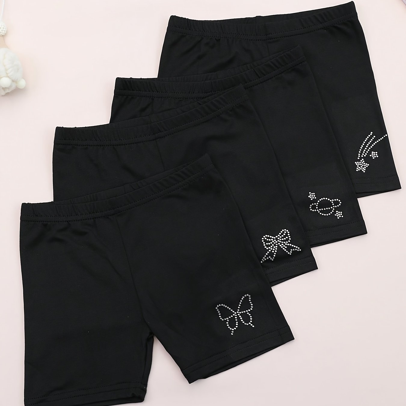 Image of 4-pack Girls' Safety Shorts With Rhinestone Black Bow, Solid Color No-cuff Bottoming Pants, Perfect For Outdoor
