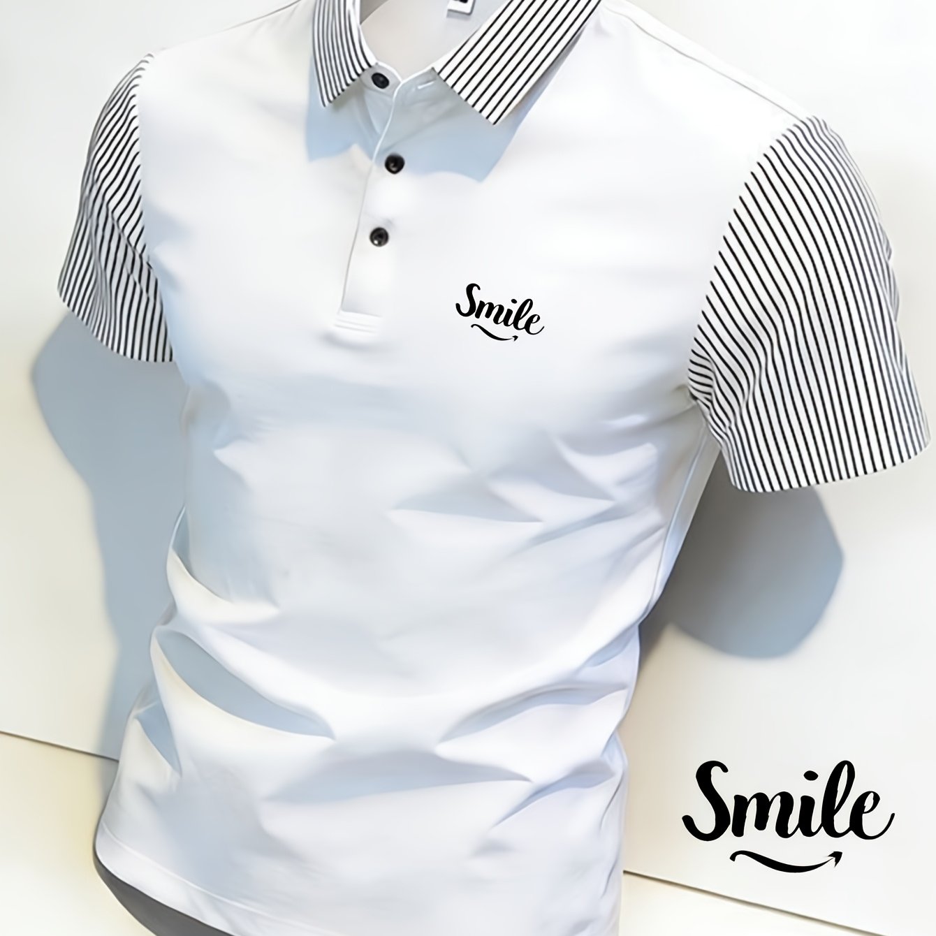 Men' -style Graphic T-shirt With "smile" Print. From Soft And Comfortable Fabric, This Menswear Top Features Collar And Mesh-like Accents On The Shoulders. An For Casual Wear