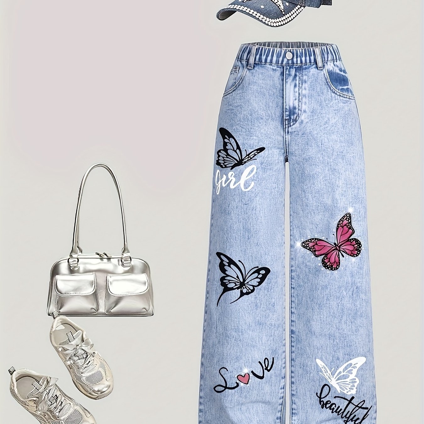 Image of Girls' Denim – Fashionable High-waisted Loose-fit Jeans In Blue Tone, Featuring And That Exudes And . The Pants Are With Multicolored Patterns And Romantic Text In Pink