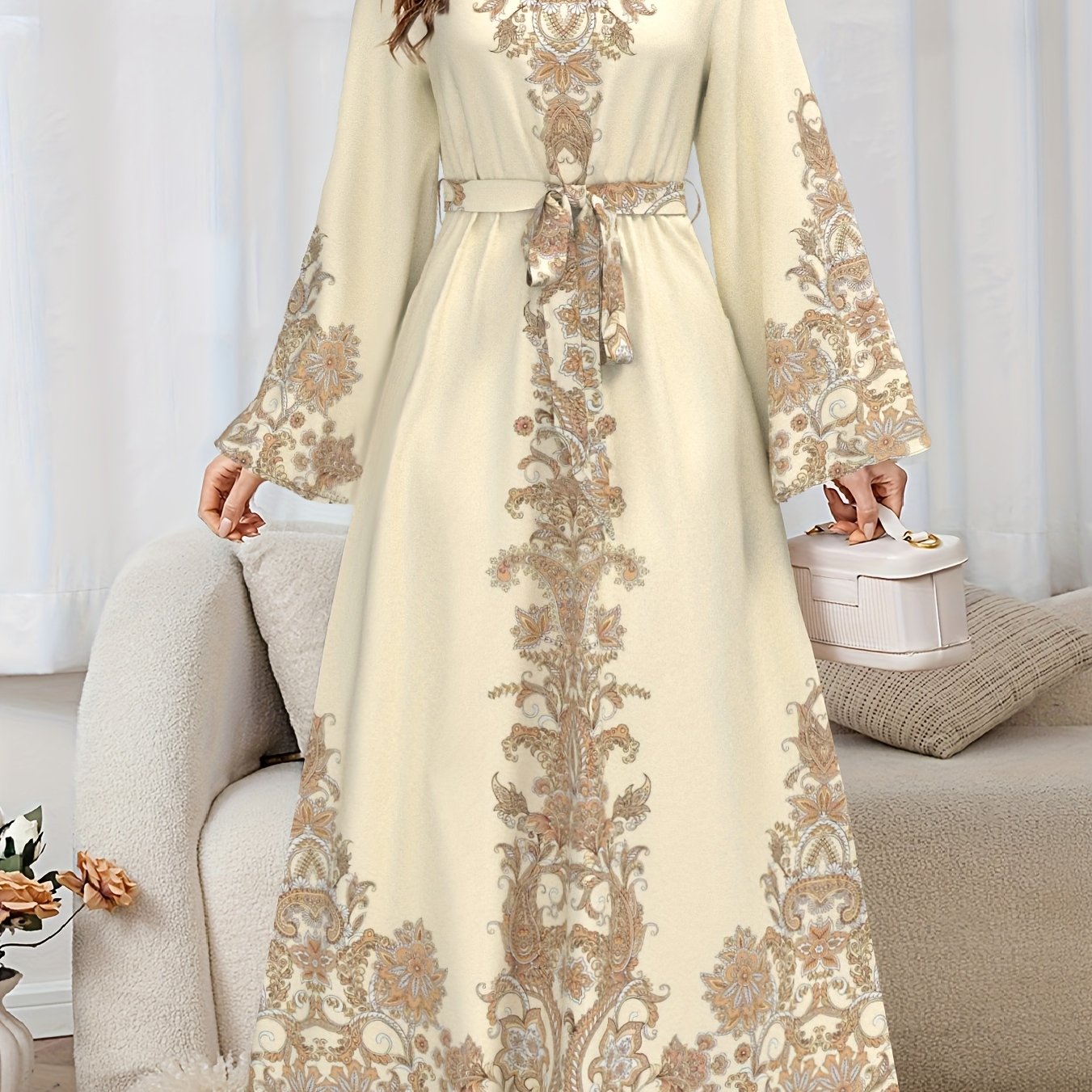 A Long-sleeved, High-collared Long Dress With Middle Eastern Print And A Belted Waist