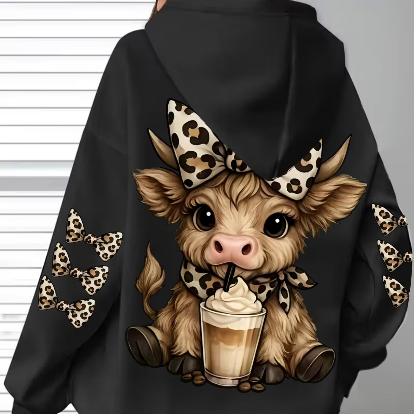 Image of Leopard Print Bow Highland Cow Print Soft And Casual Women's Hooded Sweatshirt