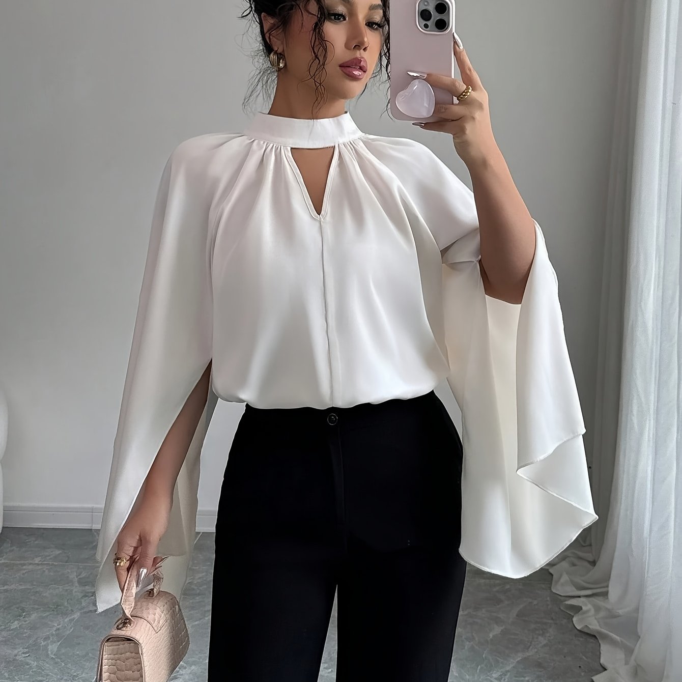A Woman's Elegant And Flowing Bell-sleeve Chiffon Fitted Blouse