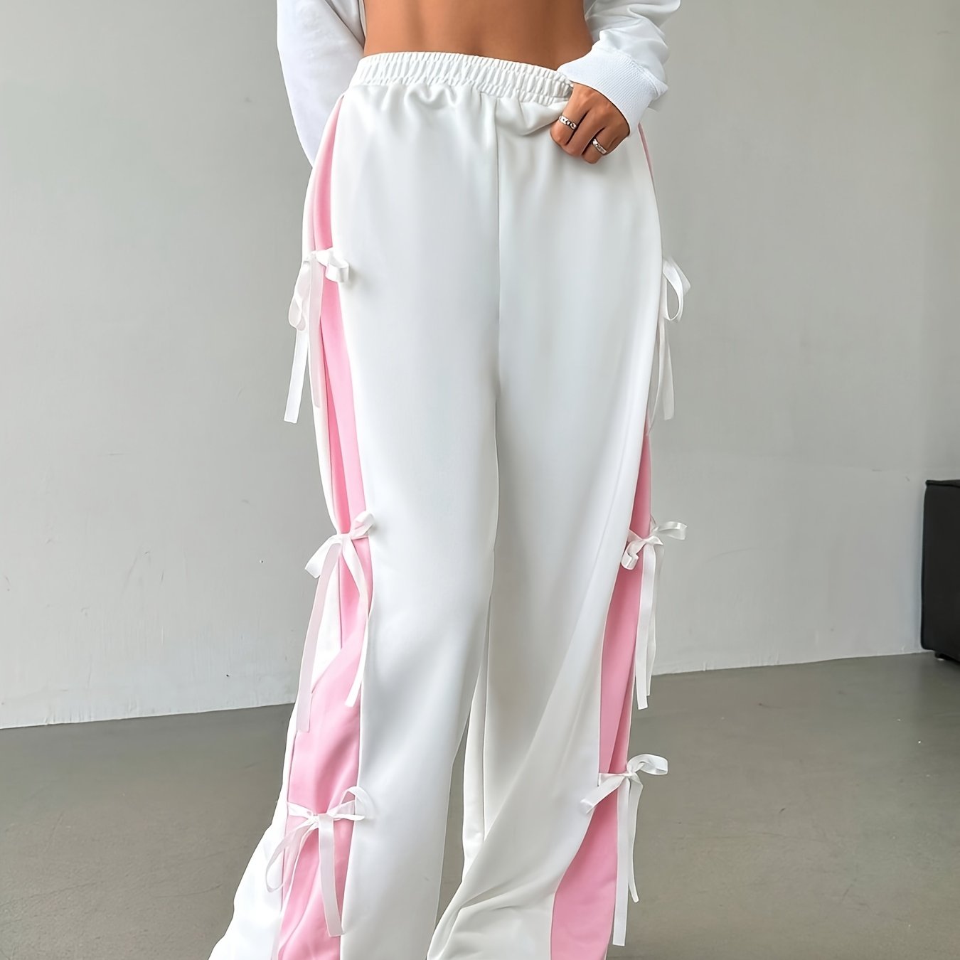 Image of 2025 Spring/summer New Women's Slim Fit Side Contrast Color Bow Tie Ribbon Fashion Wide Leg Pants Casual Elastic Waist White Pants