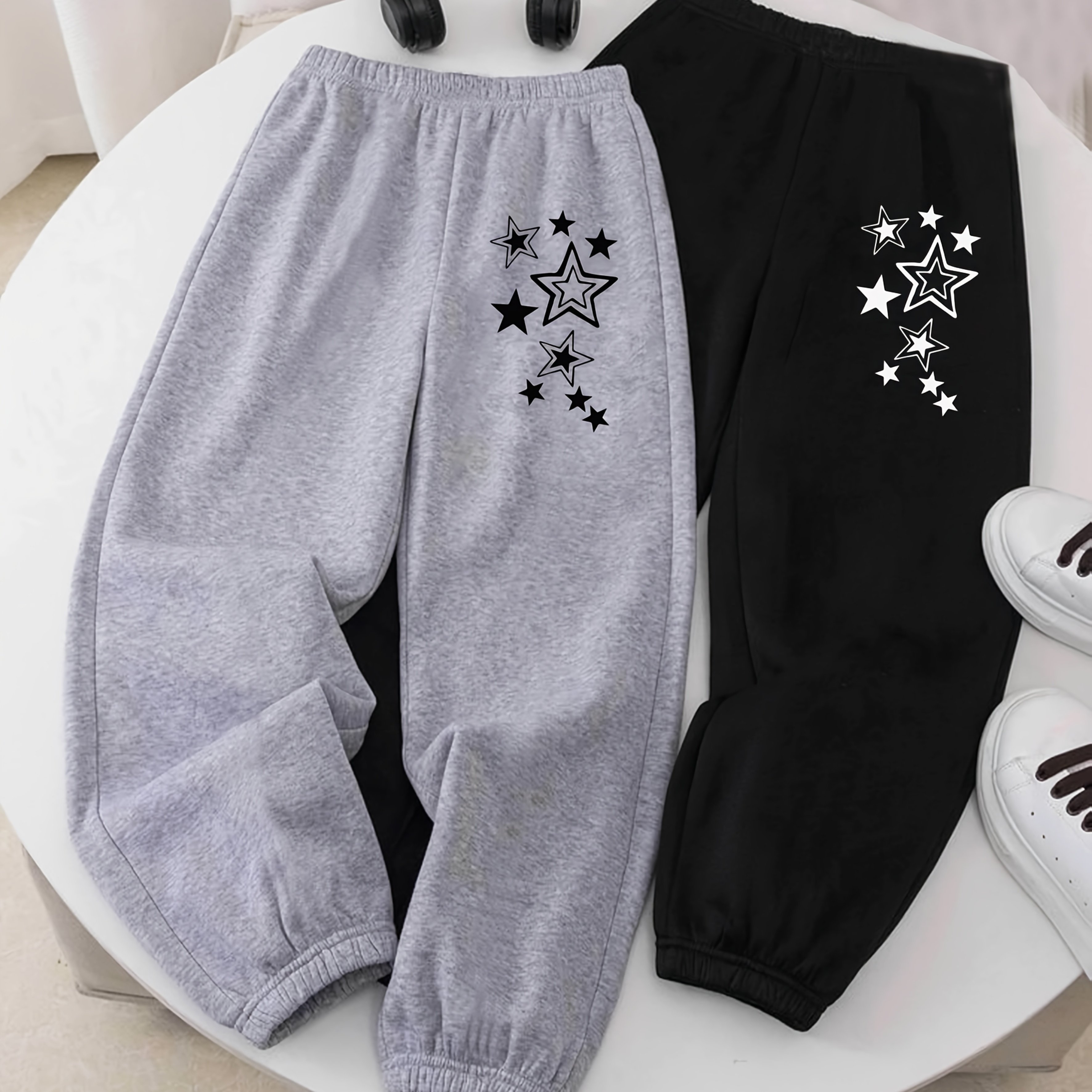 TEMU Un ensemble pièces qui une ambiance cool ! Ces joggers et noirs à imprimé étoiles tendance et polyvalents, parfaits pour le street style ! Avec