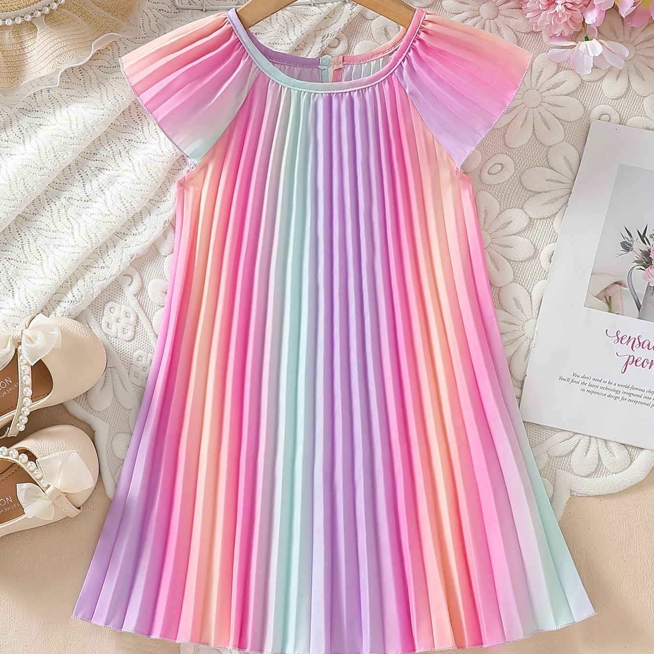 Image of A Stylish And Summer Dress For Girls, Featuring A And Cute Design With Colorful Striped And A Round Neck Short Sleeve. Perfect For Casual , Parties, Picnics, And Everyday Wear