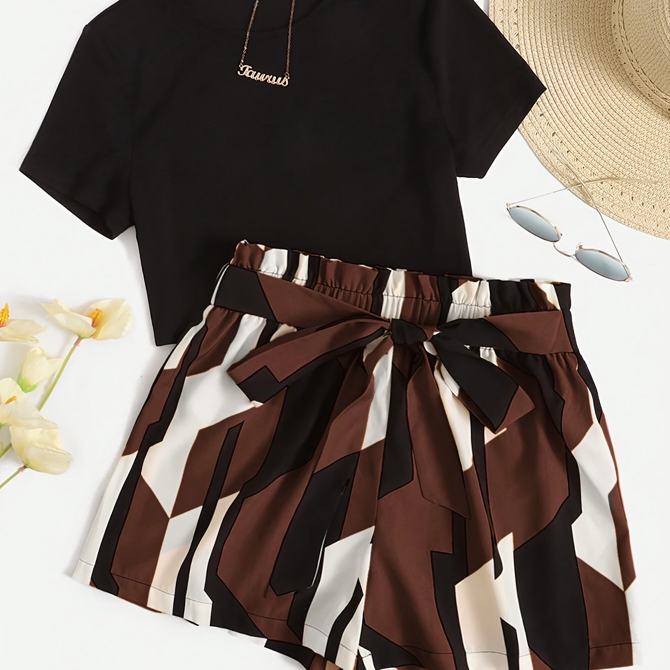 TEMU A Stylish And Elegant Casual Outfit For Women Featuring A Solid Color Short-sleeve Top And Patterned Shorts