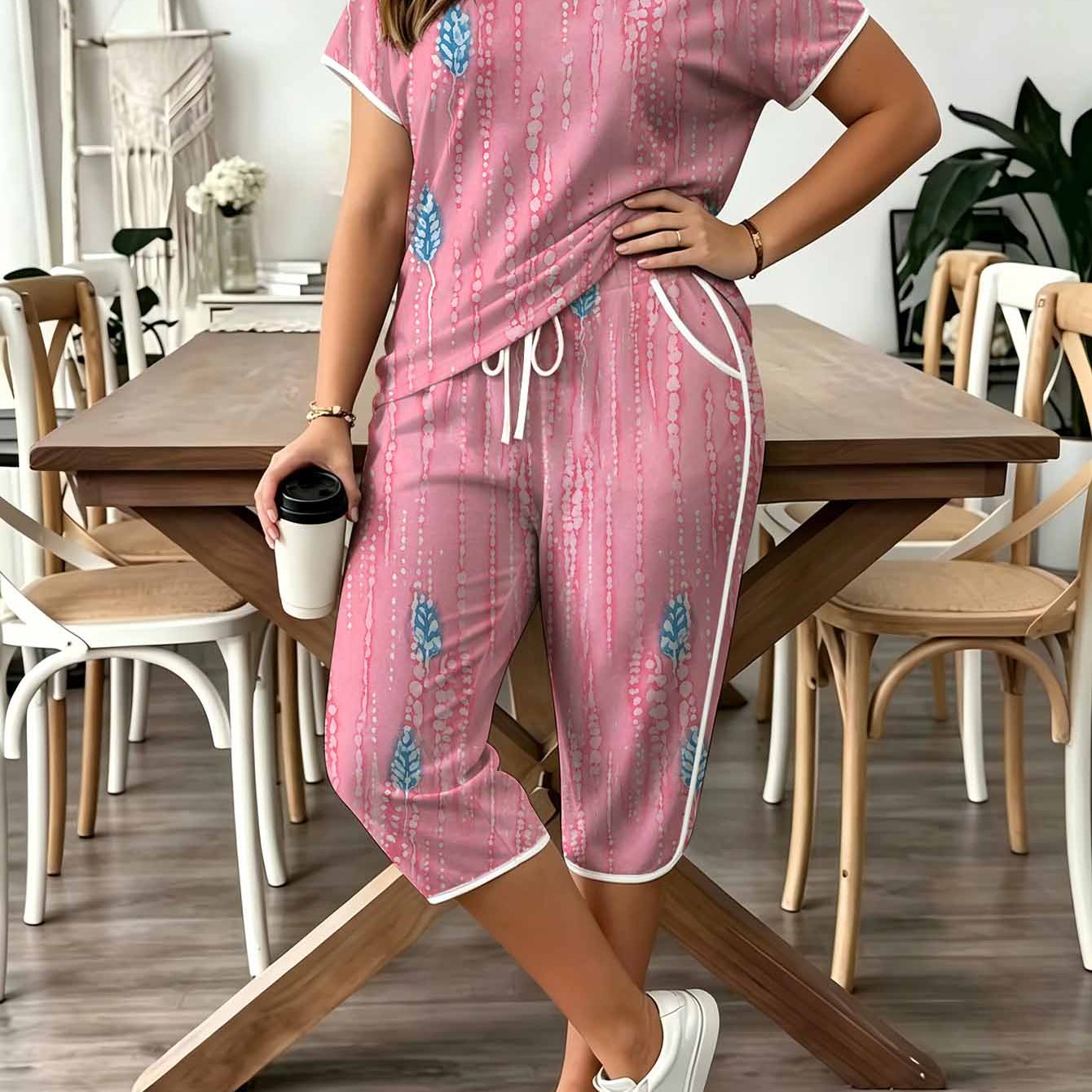 Image of Plus Size Women' White Striped Colorblocked Two-piece Set. Round Neck Short Sleeve Top And Drawstring Belt Side Pocket Capri Pants. Vintage Elegant Casual Pink Loungewear Set