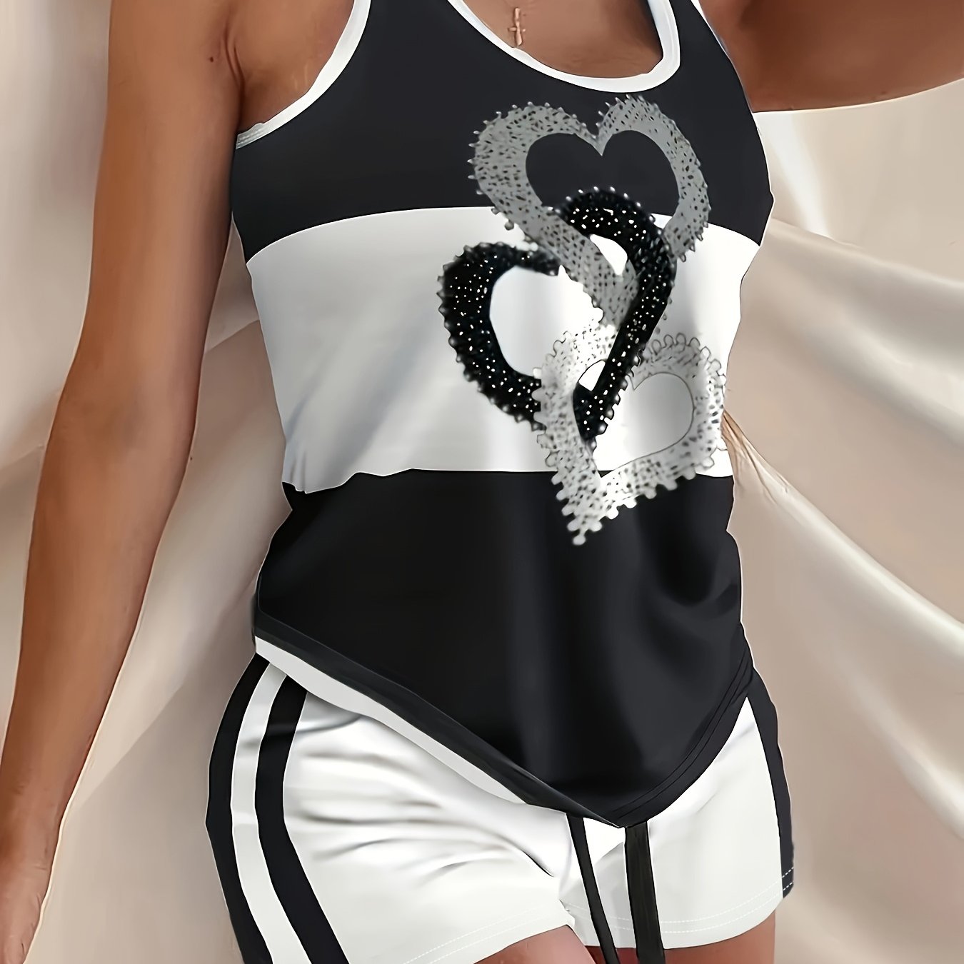 Image of 2pcs Women's Summer Slim-fit Loungewear Pajama Set, Black And White Contrast Color Heart Print Tank Top, Elastic Waist Drawstring Pocket Shorts, Suitable For Home And Vacation Beach