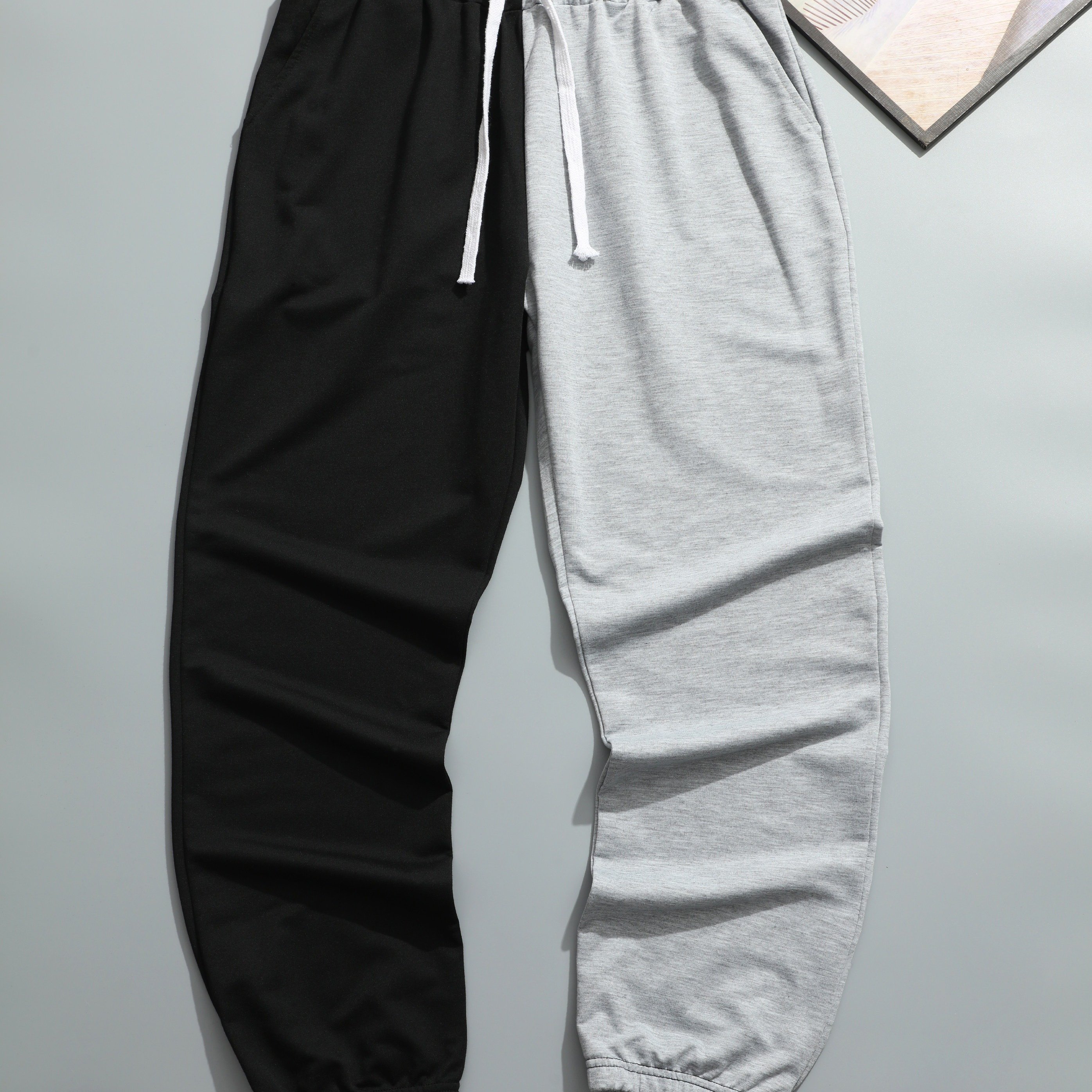 Half black half 2025 white joggers